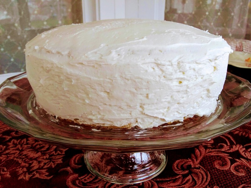 White chocolate cake with a white buttercream frosting