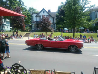 Classic cars are just a part of the fun of the July 4th Ludington parade.